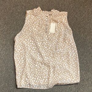 Chic Tan and White Sleeveless Blouse